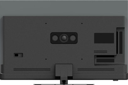 Panasonic TV-48Z90BE6 højopløsnings-tv i mat sort plast, set bagfra, med centralt rektangulært kabinet med tre cirkulære sensorer, lave ventilationsgitre og centreret fodbase