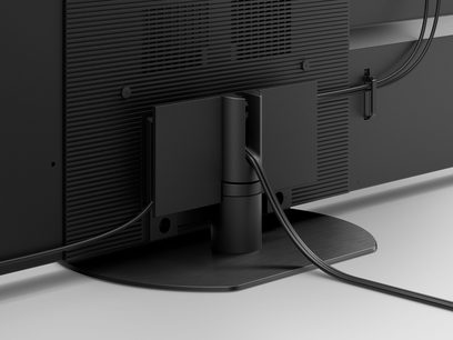 Téléviseur Panasonic TX-65MZ1500E, vue arrière, connectique, support métallique incurvé, finition noire mate