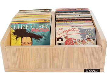 Açık renkli ahşap saklama kutusu, Julien Clerc ve Confettis'in renkli kapaklı 45'lik vinil plaklarını içeriyor