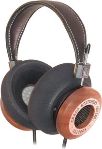 Відкриті навушники Grado GS1000x, коричневі дерев’яні чашки з ґраткою, чорні пінні амбушюри, шкіряне оголів’я, вигляд під кутом три чверті