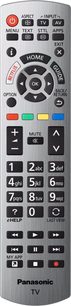 Sølvfarvet Panasonic fjernbetjening med flerfarvet knapper og LCD-skærm, der viser "HOME GUIDE", set forfra
