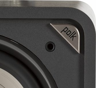 Polk Audio HTS 10 sort baskabin, nærbillede af højre forkant, sølvfarvet logo i relief