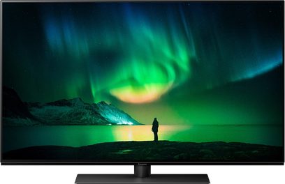 Panasonic TX-48LZ1500E-tv, der viser nordlys, sneklædte bjerge, menneskelig silhuet, sort ramme