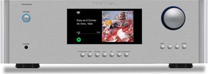 Amplificatore hi-fi integrato stereo Rotel RAS-5000, vista frontale, chassis argentato, schermo centrale, manopola del volume circolare a destra