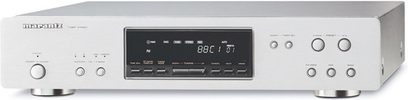 Front view of Marantz ST-6001 tuner, silver faceplate, blue display, front panel buttons and jacks