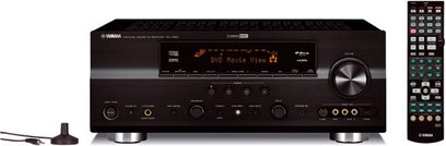 Yamaha RX-V863 sort hjemmebiografsforstærker, set forfra, orange display, sølvfarvede knapper og drejeknapper, hovedtelefonstik til højre