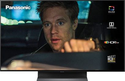 Panasonic TX-65GZ1000E OLED 4K HDR-fladskærm, der viser et nærbillede af en skægget mands ansigt set forfra