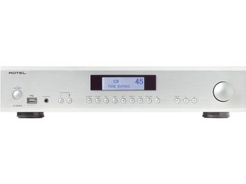Amplificatore hi-fi stereo Rotel A12 MKII argento, vista frontale, display LCD blu che indica "CD TONE BYPASS 45", pulsanti e prese