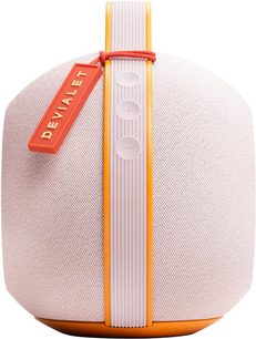 Портативна bluetooth-колонка DEVIALET Mania рожева, вигляд спереду, округла форма з центральною помаранчевою ручкою та видимими кнопками
