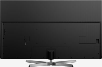 Panasonic TX-65EX780E tv, sort flad skærm, set forfra, X-formet metalfod, tilslutningsmuligheder på bagsiden