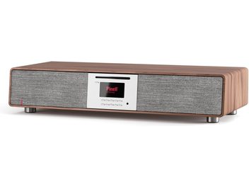 Pinell of Norway Supersound 901 all-in-one high-fidelity system, walnut, rectangular case in walnut wood veneer seen from a three-quarter front angle with a two-tone front panel featuring gray fabric and a central aluminum section with black display, CD slot, row of buttons, and cylindrical metal feet