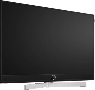 Téléviseur Loewe Stellar 48 DR+ noir à écran plat, vue de face légèrement en angle, avec pied central argenté