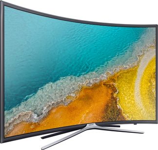 Samsung UE49K6300AKXZF buet TV der viser en gul sandstrand og et turkisblåt hav med skummende bølger