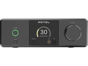 Preamplificatore per cuffie hi-fi Rotel DX-3 nero con chassis in metallo, vista frontale, display centrale retroilluminato con indicatore circolare, ampia manopola del volume a destra e pulsante di accensione con anello verde a sinistra
