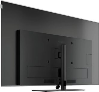 Loewe Antares 55 sort fjernsyn, set bagfra med centralt stativ og integreret tilslutningspanel