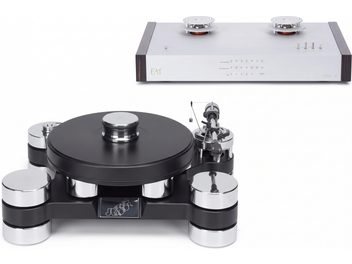 Schwarz-silberner Transrotor-Plattenspieler mit Tonarm und EAT-Vorverstärker im Hintergrund