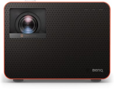 Проєктор Benq X3100i чорного кольору, вид спереду, об'єктив у центрі, оточений червоною шестикутною решіткою