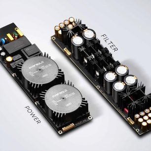 Netværkslydafspiller EverSolo DMP-A10, set ovenfra, to rektangulære sorte moduler, synlige elektroniske komponenter