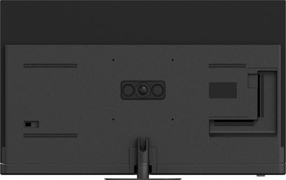 Panasonic TV-65Z90B højopløsnings-tv i mat sort plast, set bagfra med rektangulært kabinet med horisontale ventilationsgitre, central plade med tre cirkler, VESA-monteringspunkter og centralt fodstativ