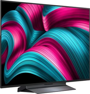 Τηλεόραση υψηλής ευκρίνειας LG OLED48C5 μαύρη με εξαιρετικά λεπτό πλαίσιο από μέταλλο και πλαστικό, με μεγάλη επίπεδη οθόνη που προβάλλει αφηρημένο μοτίβο σε ροζ και τιρκουάζ αποχρώσεις, τοποθετημένη σε ορθογώνια βάση, λήψη από τρία τέταρτα