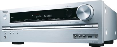 Onkyo TX-NR535 sølvfarvet hjemmebiograf-forstærker, frontpanel, blå skærm, sølvfarvede knapper og drejeknapper, hovedtelefonstik