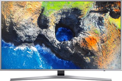 Samsung UE40MU6405 tv set forfra, skærmen viser en luftoptagelse af klipper og turkisblåt vand