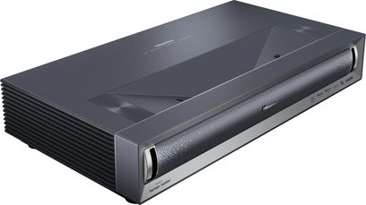 Hisense PX3-Pro Projector, angled view, smooth top surface, perforated grille at the front, grooved sides