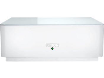 Biely subwoofer Canton Smart Sub 10, pohľad spredu, minimalistický obdĺžnikový dizajn so sklenenou hornou doskou