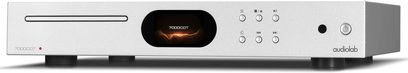 Reproductor de CD de alta fidelidad Audiolab 7000CDT plateado con panel frontal rectangular, pantalla central, ranura para CD a la izquierda y botones a la derecha