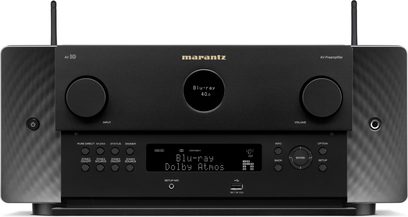 Marantz AV 10 black home theater preamplifier, front view, "Blu-ray Dolby Atmos" displayed on screen, numerous controls and connections