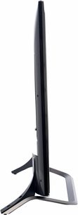LG 49UF778V-fladskærms-TV, set fra siden, flad skærm, sort ramme og fod, rektangulær base vippet bagud