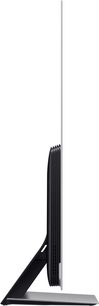 Samsung QE65S95B 2022 fladskærms-TV, set fra siden, lodret fladskærm, smal rektangulær sort forlænget fod