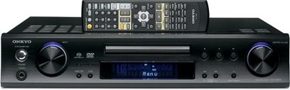 Sort Onkyo LS-V501 hjemmebiografsystem med integreret DVD-afspiller, blåt display, knapper og stik på forsiden