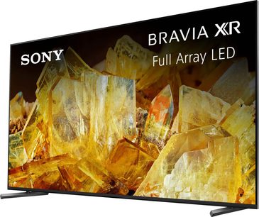 Sony XR65X90L, fladskærm, set fra trekvart vinkel, gule krystaller i nærbillede, sort ramme, rektangulære fødder