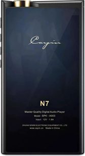 Cayin N7 audiophile music player in black, with a glossy glass back set in a black metal chassis, partially visible gold knurled wheel on the upper left edge, rear view from the front