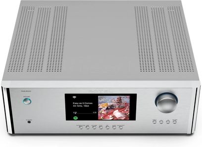 Integrert stereo hi-fi forsterker RAS-5000, sett ovenfra, rektangulært sølvfarget kabinett, sentralt display, roterende knapp til høyre