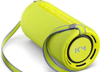 Přenosný Bluetooth reproduktor Loewe We. HEAR pro ve fluorescenční žluté, cylindrický tvar s dvoubarevným popruhem, pohled shora
