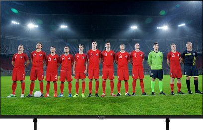 Panasonic TX-43LX800E tv-skærm, der viser et fodboldhold opstillet på en kunstgræsbane