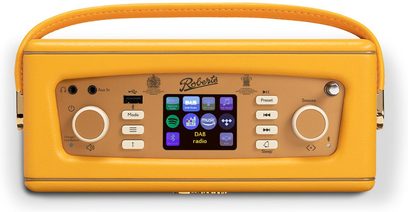 Radio da tavolo Roberts Revival iStream 3L, custodia rettangolare in pelle gialla con maniglia coordinata, frontale beige con schermo centrale a colori, due ghiere circolari e diversi pulsanti.