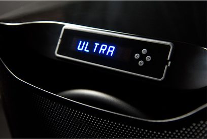 SVS PB16-Ultra gloss black subwoofer, blue "ULTRA" LED display, silver knobs, black grille, close-up view