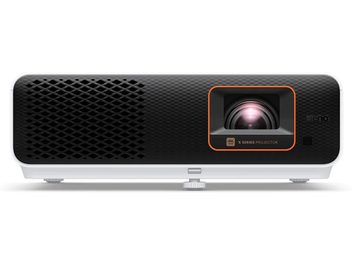 Βιντεοπροβολέας Benq X500i μαύρος, μπροστινή όψη, κεντρικός φακός πορτοκαλί, γρίλια σε σχήμα κηρήθρας, λευκή βάση