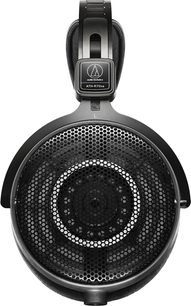 Sluchátka Audio Technica ATH-R70xa v černé barvě s otevřenou konstrukcí, pohled zepředu, levý kruhový náhlavní soustava s širokou kovovou mřížkou ve tvaru včelí plástve a matovým plastovým obloukem