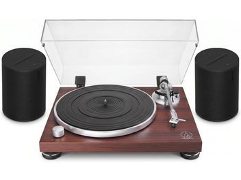 Audio-Technica vinylspelare i träfinish med transparent lock och två svarta Sonos-högtalare