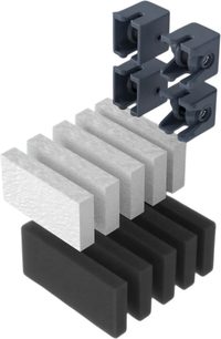 Complete HumminGuru maintenance kit with four gray holders and white and black rectangular blocks