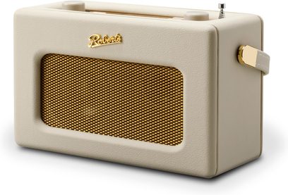 Radio de birou Roberts Revival iStream 3L în piele ecologică crem cu textură granuloasă, grilă frontală metalică mare aurie, logo auriu, două butoane superioare asortate cu antenă telescopică, fixare laterală pentru curea aurie, vedere din față trei sferturi dreapta
