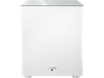 Biely matný subwoofer Canton Smart Sub 12, pohľad spredu, kockový dizajn so sklenenou hornou doskou a kovovými nožičkami