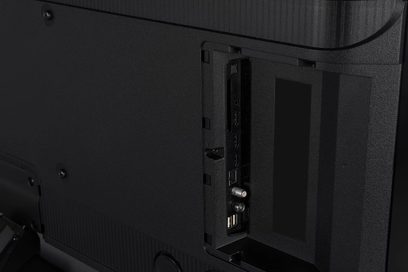 Panasonic TV-48Z80AEZ højdefinitions-tv med bagudvendt visning, der viser et åbent tilslutningspanel og flere synlige porte