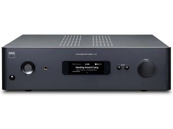 Amplificador de alta fidelidad estéreo NAD C399 negro, vista frontal, pantalla central, botones y tomas en la parte delantera, rejilla de ventilación en la parte superior