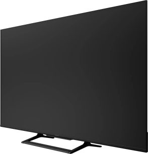 Fekete Panasonic TN-65W90C televízió háromnegyedes nézetből, kikapcsolt képernyővel, vékony kerettel és téglalap alakú talppal