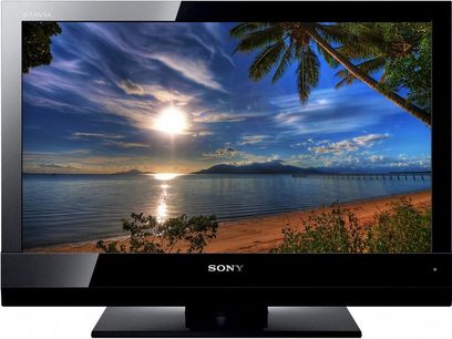 Sony KDL-22BX200B 22-tommer TV med matsort ramme, der viser en tropisk strand ved solnedgang